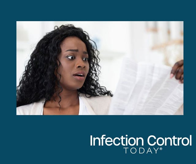An Infection preventionist reading an IFU.  (Adobe Stock 864527400 by Prostock-studio)